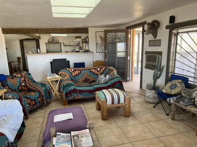 a bedroom with furniture and a bed