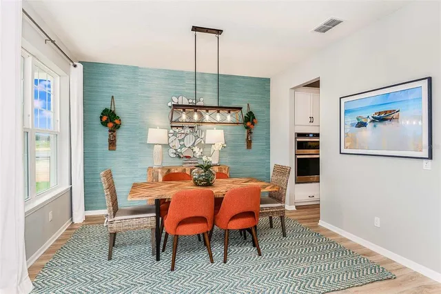 a view of a dining room with furniture