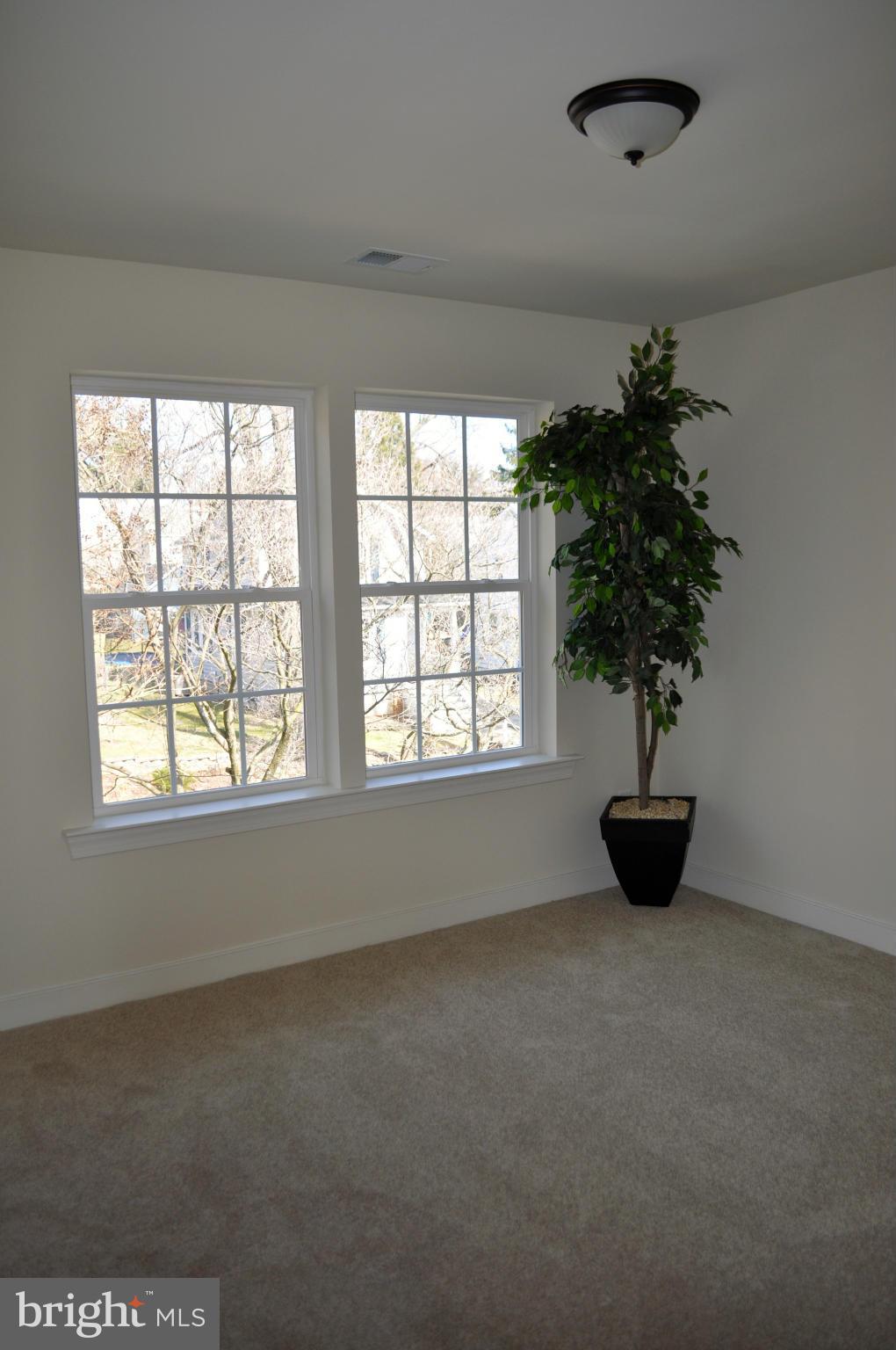 1011 Overbrook Road Baltimore, MD 21239 - Photo 12 of 24 an empty room with window