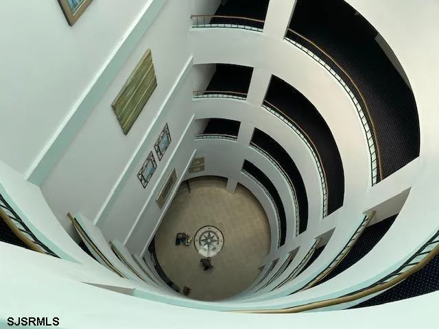 a living room with furniture and white walls