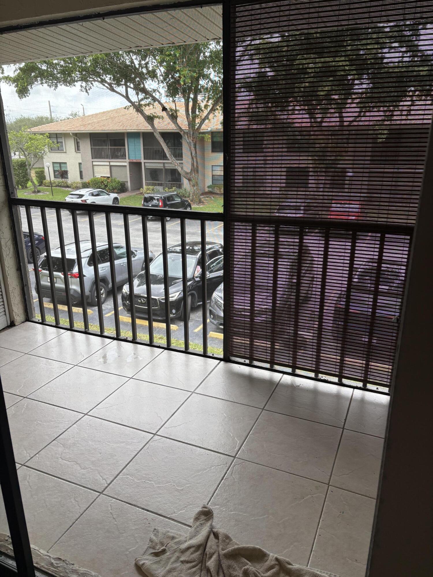 9845 Pineapple Tree Drive, Unit 208 Boynton Beach, FL 33436 - Photo 14 of 21 a view of a balcony