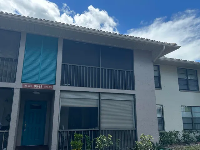 a childrens park with lots of swings and slides