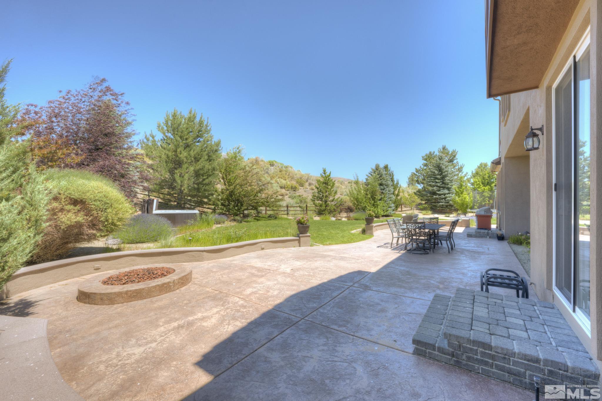 8490 Castlehawk Court Reno, NV 89523 - Photo 8 of 40 a view of a backyard with swimming pool