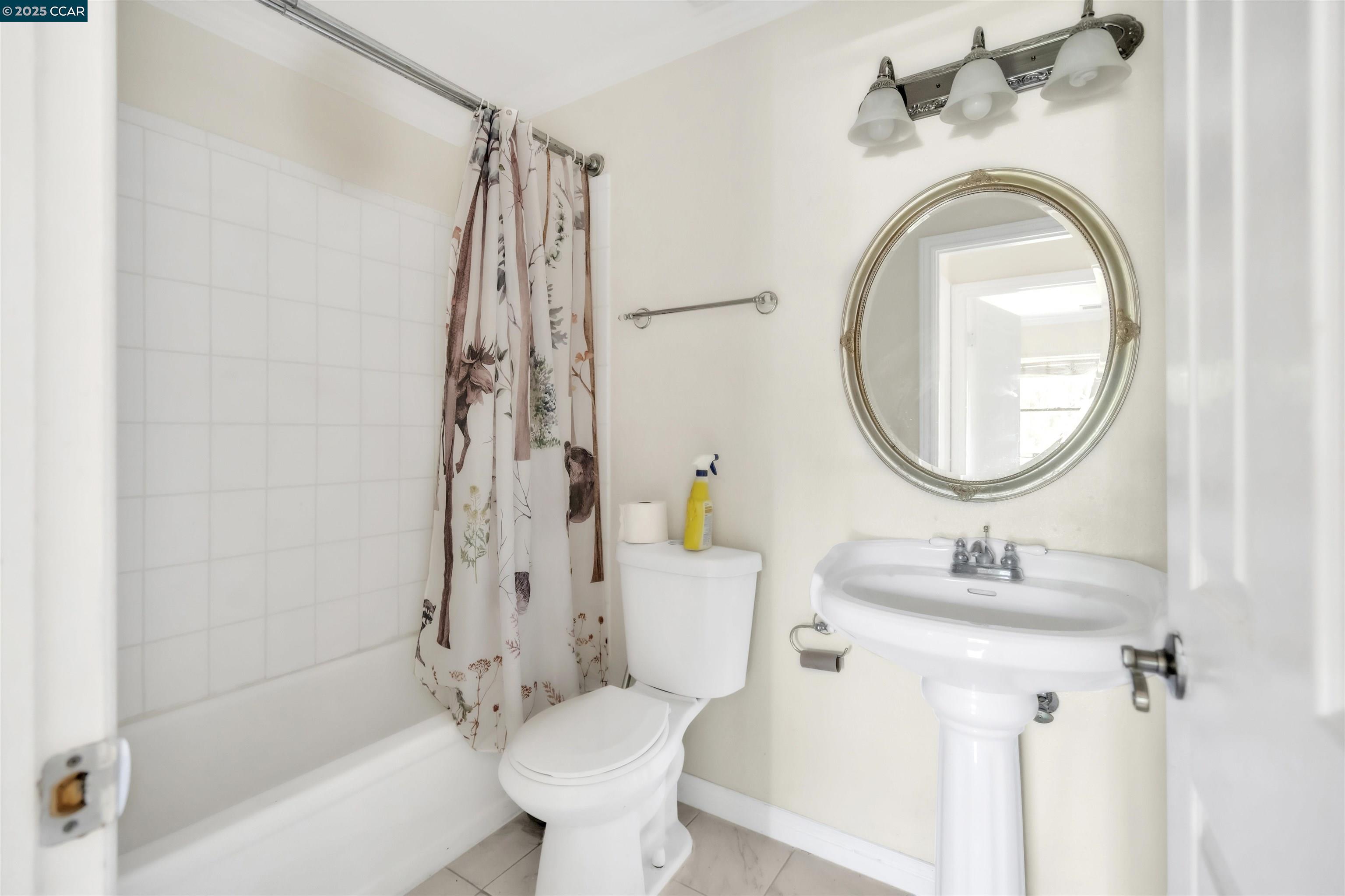 1544 Bailey Road, Unit 30 Concord, CA 94521 - Photo 14 of 20 a bathroom with a sink toilet and shower