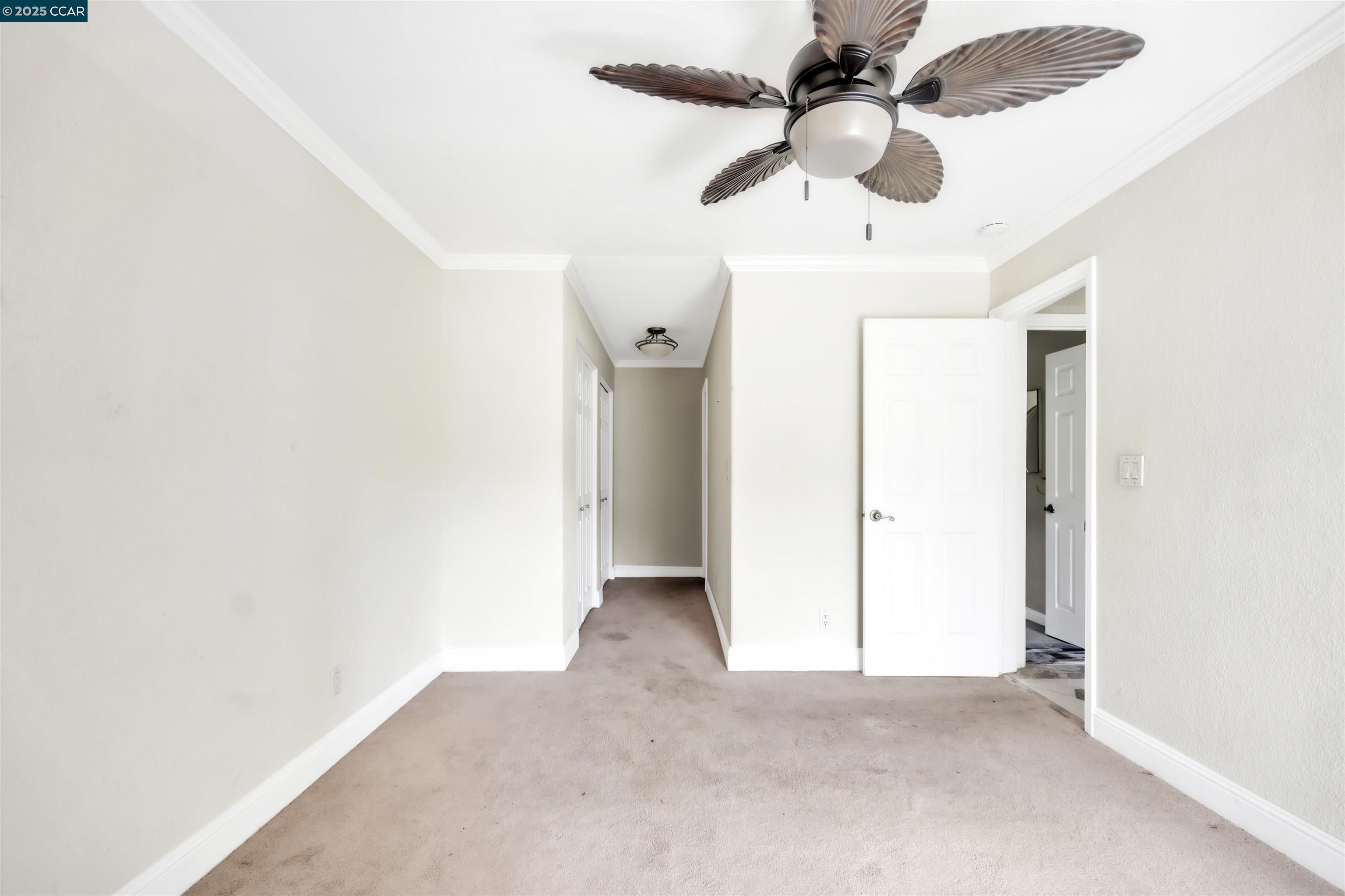 1544 Bailey Road, Unit 30 Concord, CA 94521 - Photo 16 of 20 an empty room with a ceiling fan and a window