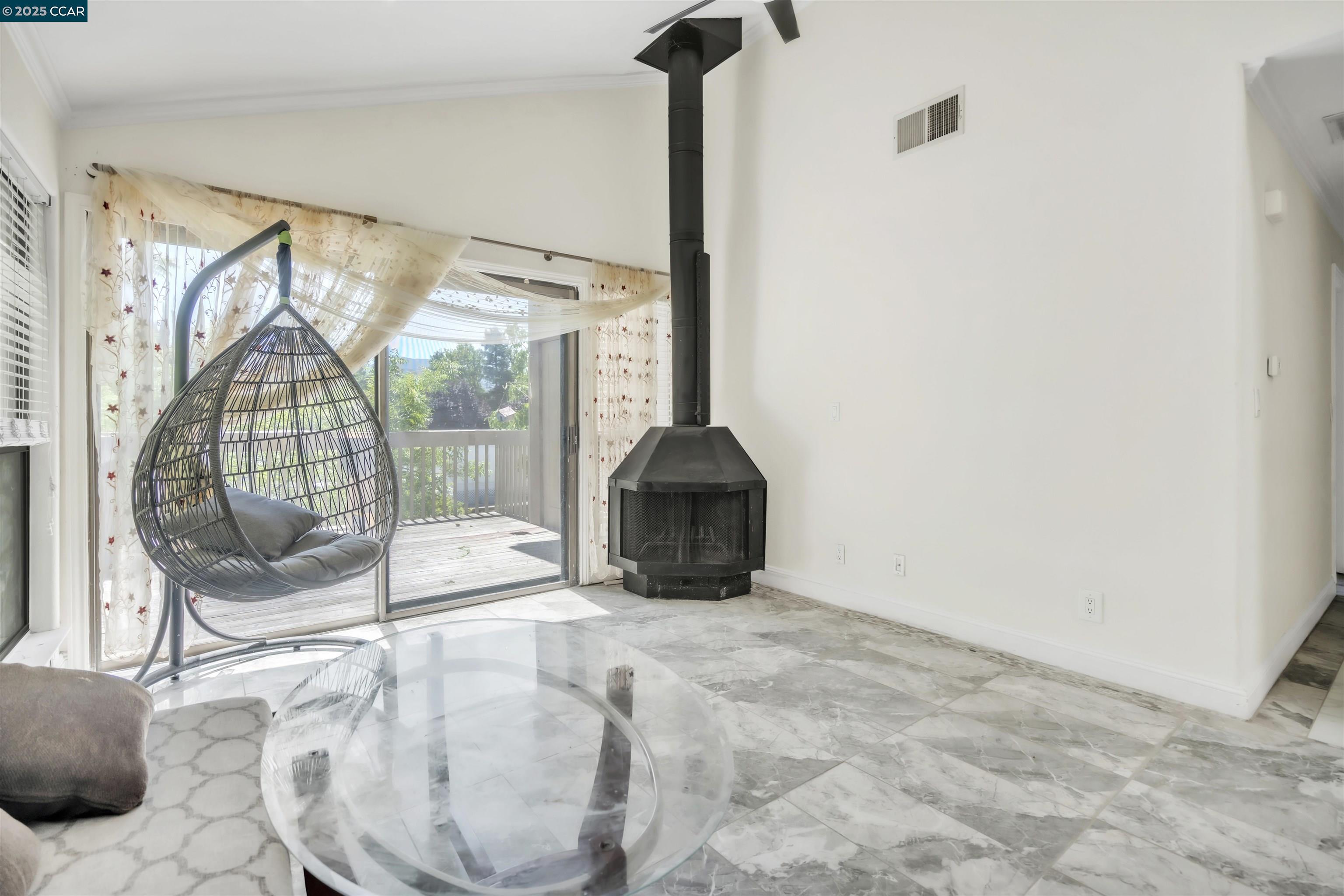 1544 Bailey Road, Unit 30 Concord, CA 94521 - Photo 4 of 20 a view of empty room with wooden floor and fan