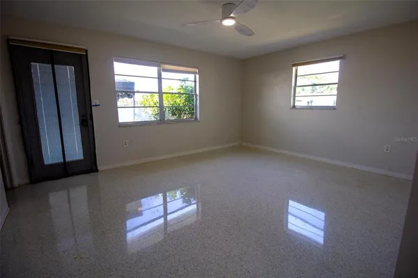 an empty room with windows