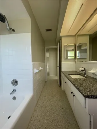 a view of an ocean from a ceiling fan