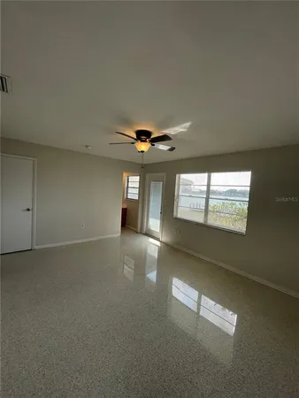 an empty room with windows