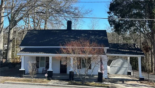 a front view of a house with street
