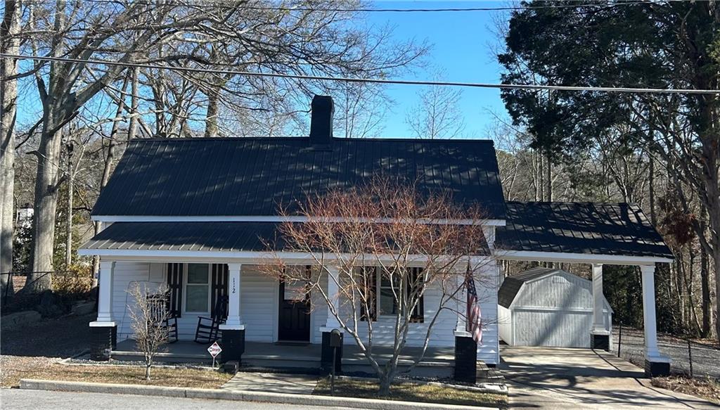 112 Park Street Dallas, GA 30132 - Photo 1 of 1 a front view of a house with street