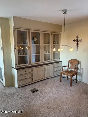 a room with furniture and window