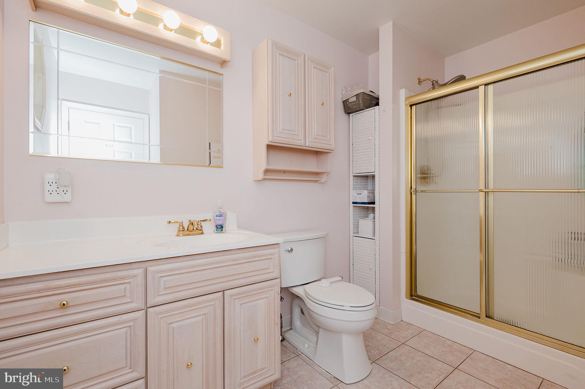 2222 Monocacy Road Essex, MD 21221 - Photo 29 of 70 Elegant bathroom with golden accents.