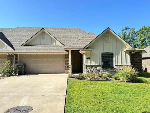 a front view of house with yard