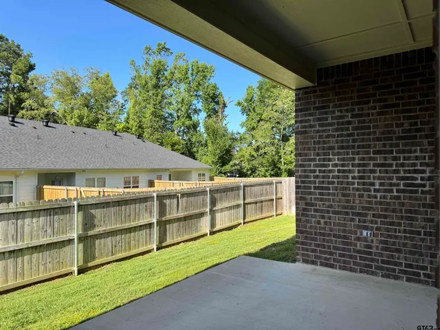 a view of a backyard with a garden