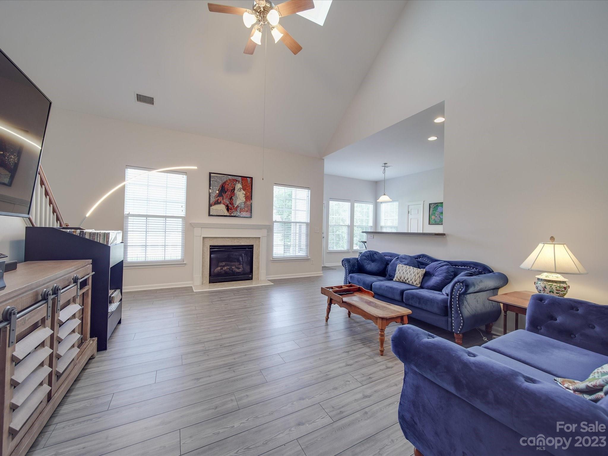 10102 Trailmoor Road Charlotte, NC 28278 - Photo 19 of 44 a living room with furniture and a fireplace