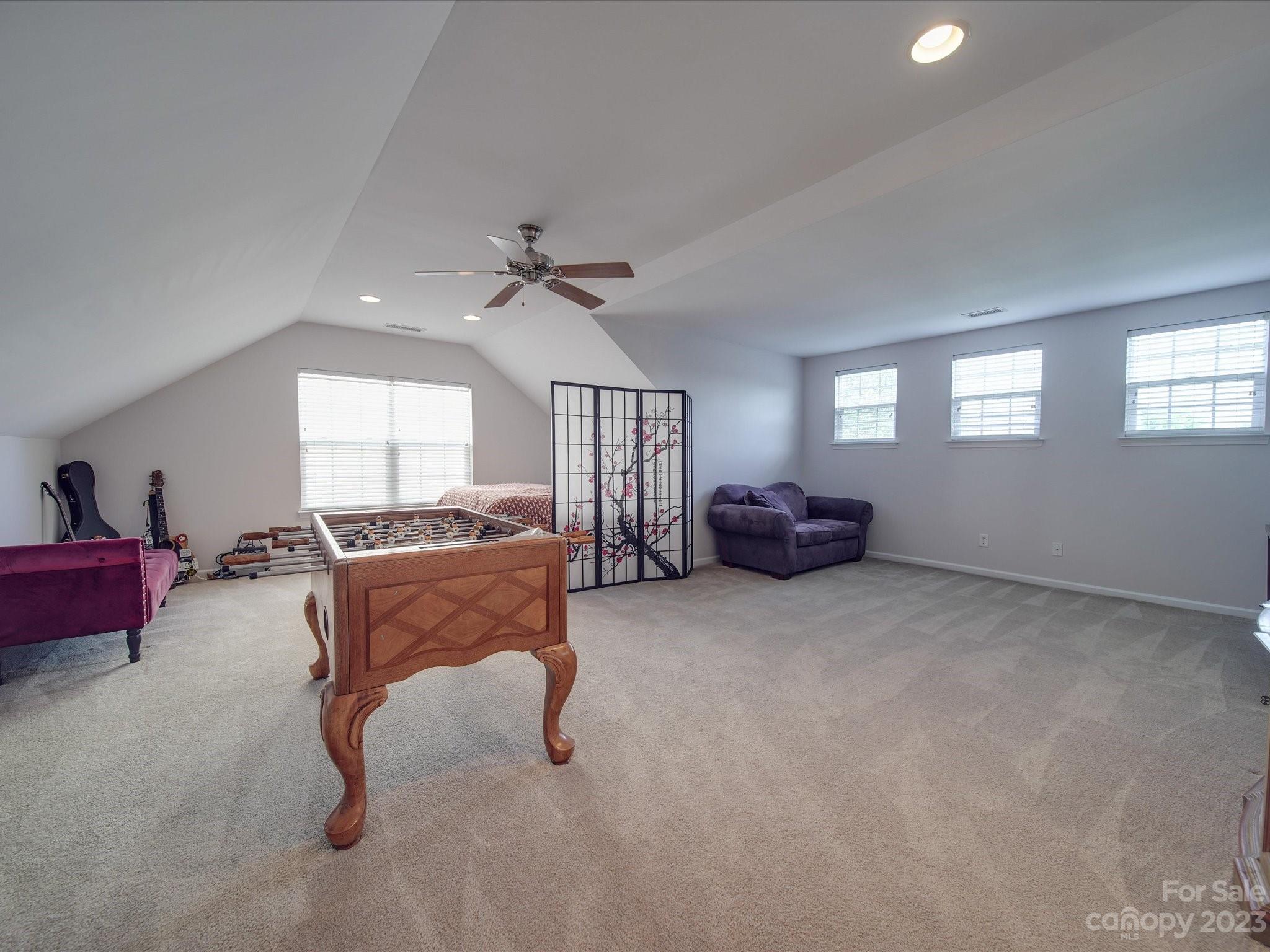 10102 Trailmoor Road Charlotte, NC 28278 - Photo 22 of 44 a living room with furniture and a window