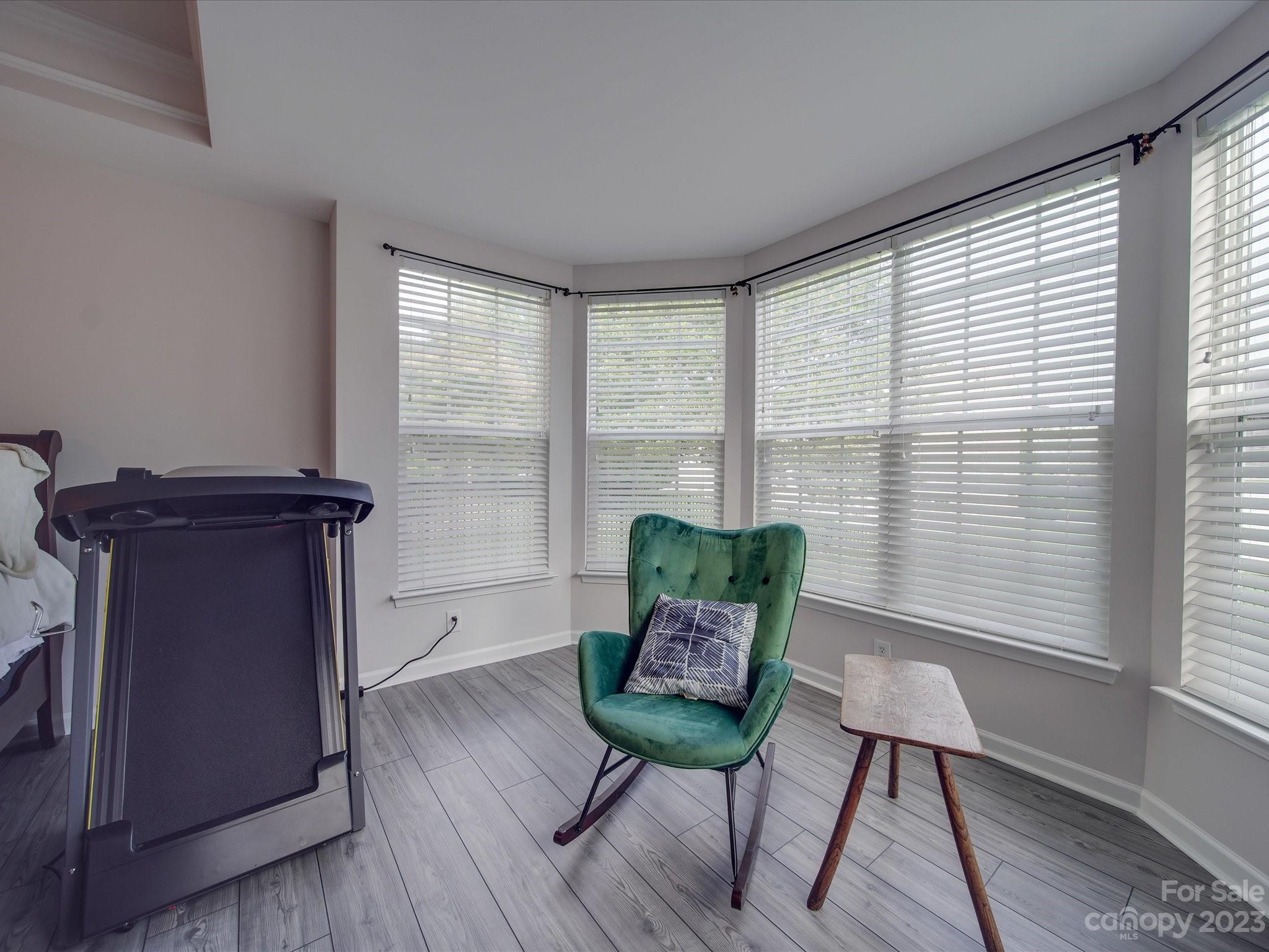 10102 Trailmoor Road Charlotte, NC 28278 - Photo 28 of 44 a living room with furniture and a window