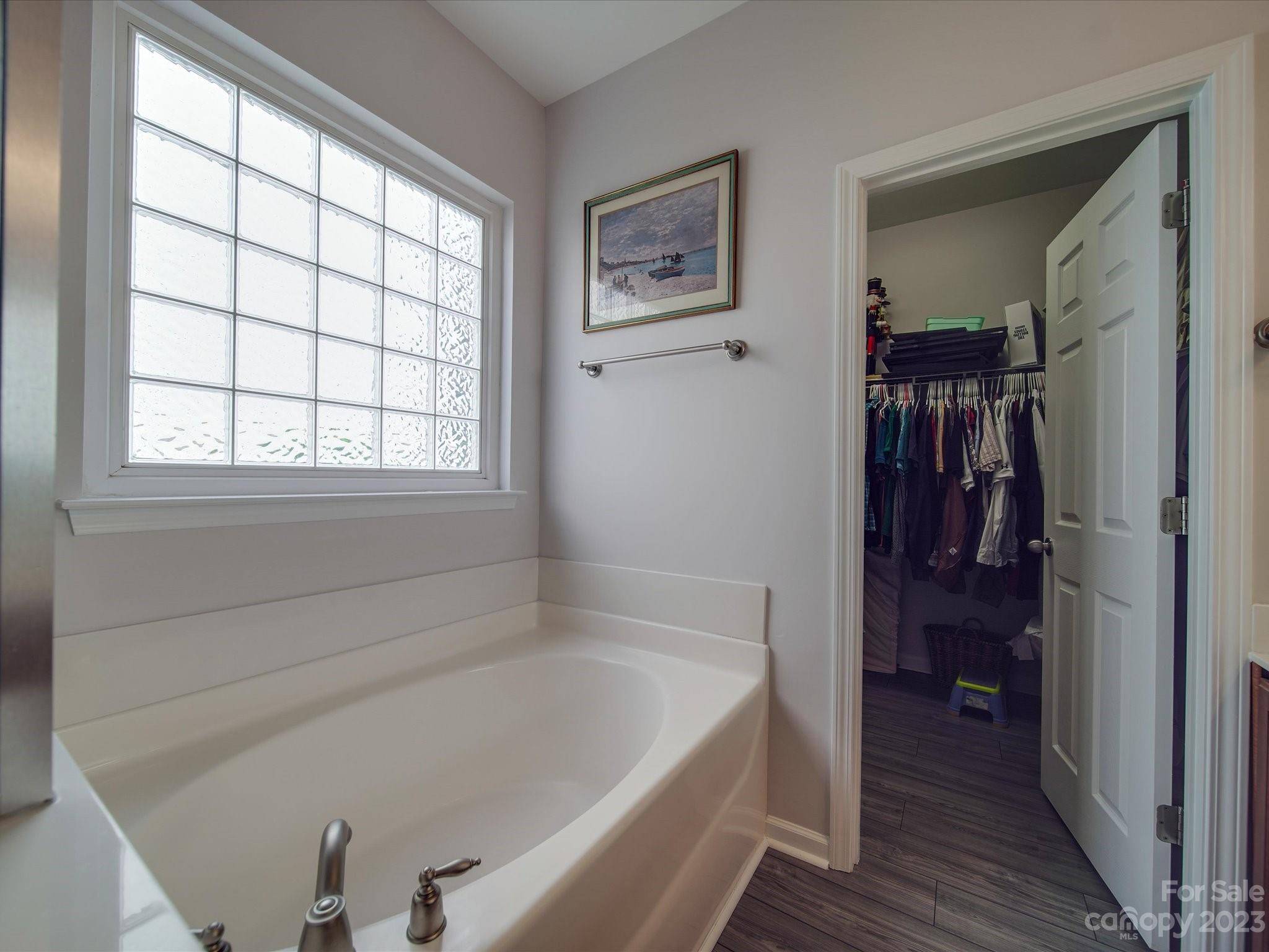 10102 Trailmoor Road Charlotte, NC 28278 - Photo 33 of 44 a bathroom with a bathtub and a shower