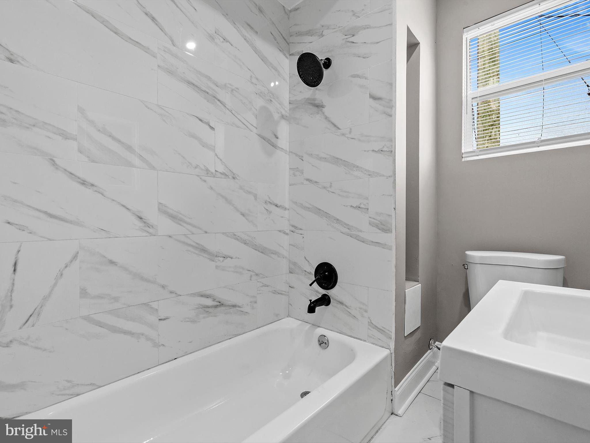 3032 Chelsea Terrace Baltimore, MD 21216 - Photo 22 of 29 a bathroom with a tub