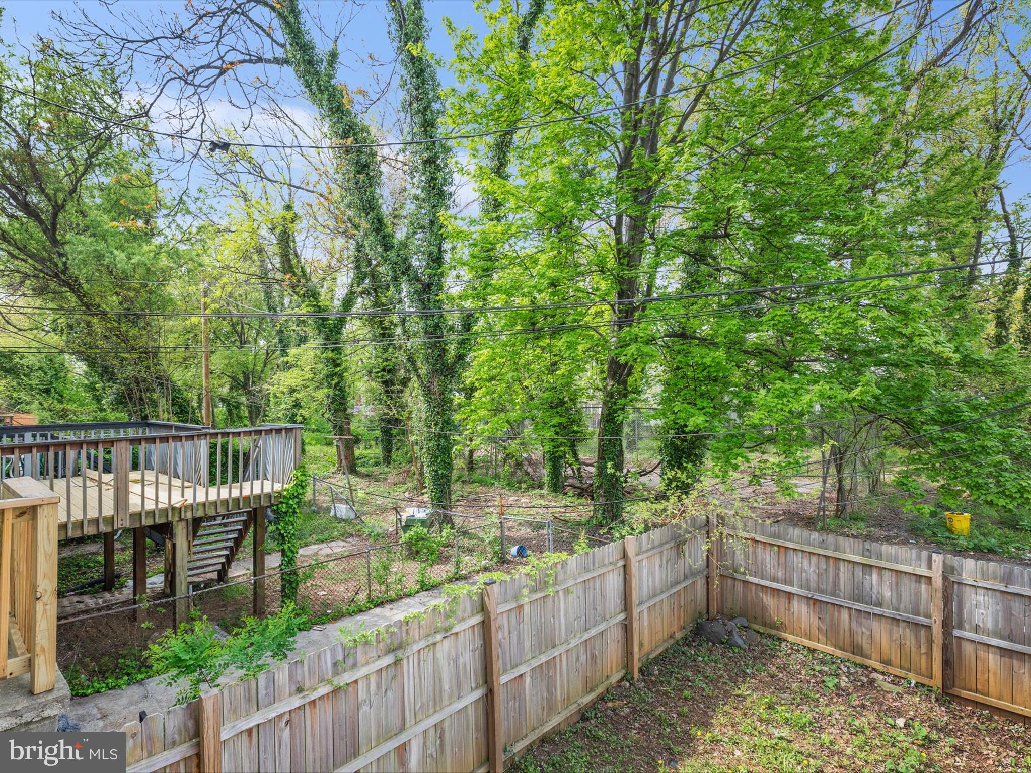 3032 Chelsea Terrace Baltimore, MD 21216 - Photo 28 of 29 a balcony with trees in the background