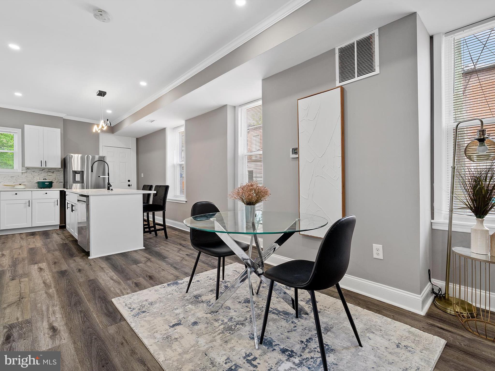 3032 Chelsea Terrace Baltimore, MD 21216 - Photo 7 of 29 a view of a dining room with furniture and wooden floor