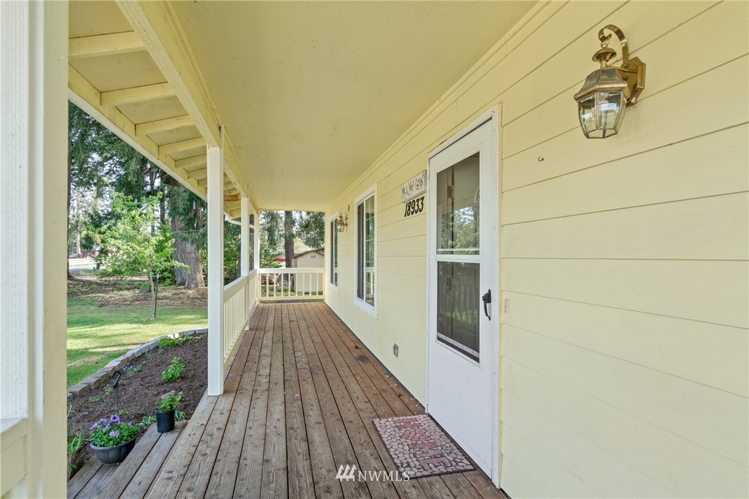 18933 Nutmeg Street Southwest Rochester, WA 98579 - Photo 4 of 18 a view of balcony with wooden floor