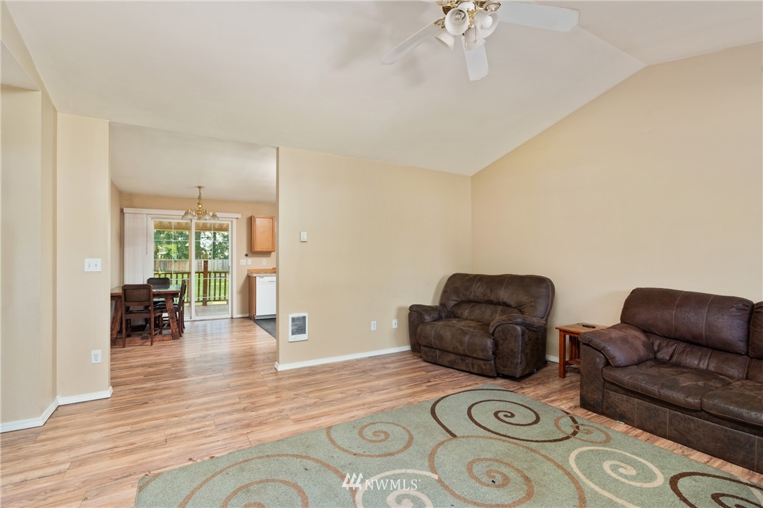 18933 Nutmeg Street Southwest Rochester, WA 98579 - Photo 5 of 18 a living room with furniture and a table
