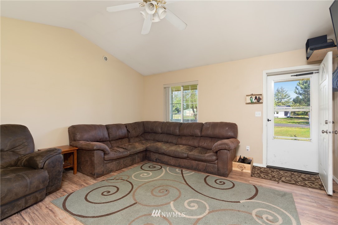18933 Nutmeg Street Southwest Rochester, WA 98579 - Photo 6 of 18 a living room with furniture and a window