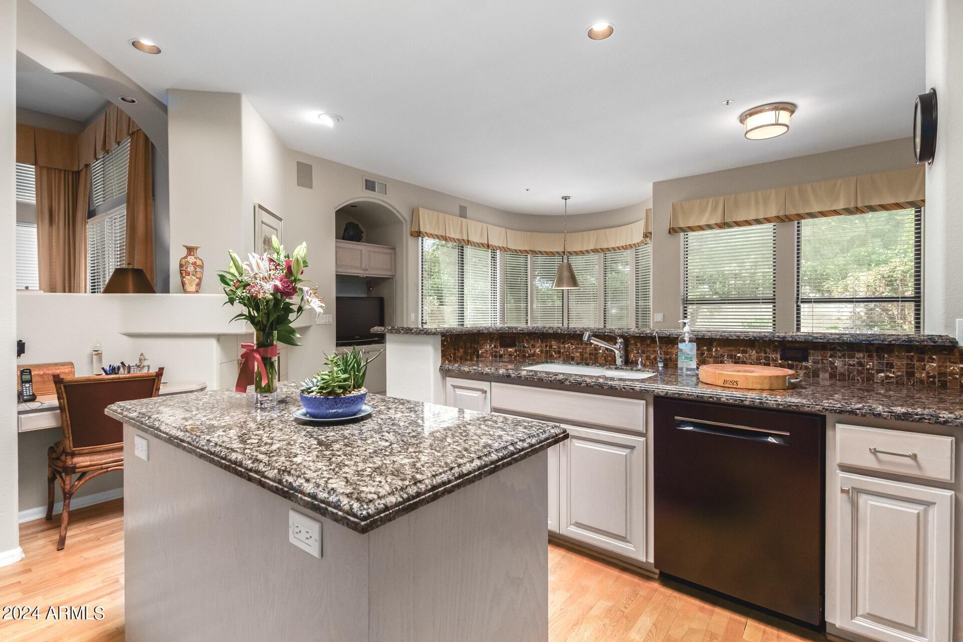 7705 East Doubletree Ranch Road, Unit 28 Scottsdale, AZ 85258 - Photo 11 of 49 Kitchen Island