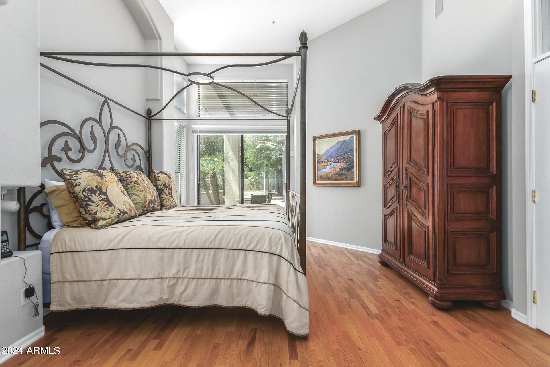 7705 East Doubletree Ranch Road, Unit 28 Scottsdale, AZ 85258 - Photo 17 of 49 Primary Bedroom with Backyard Access