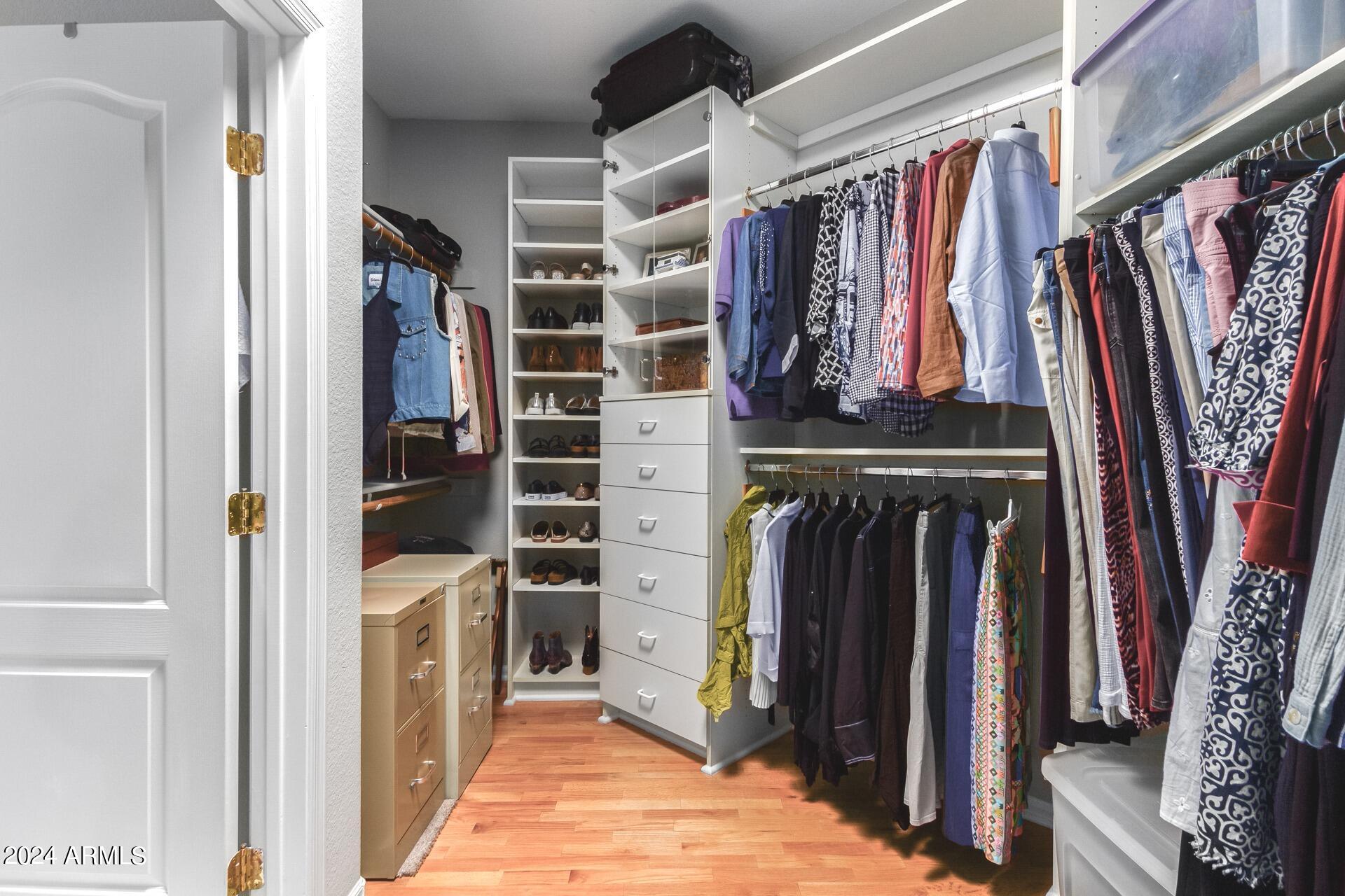7705 East Doubletree Ranch Road, Unit 28 Scottsdale, AZ 85258 - Photo 25 of 49 Primary Closet with Built-ins