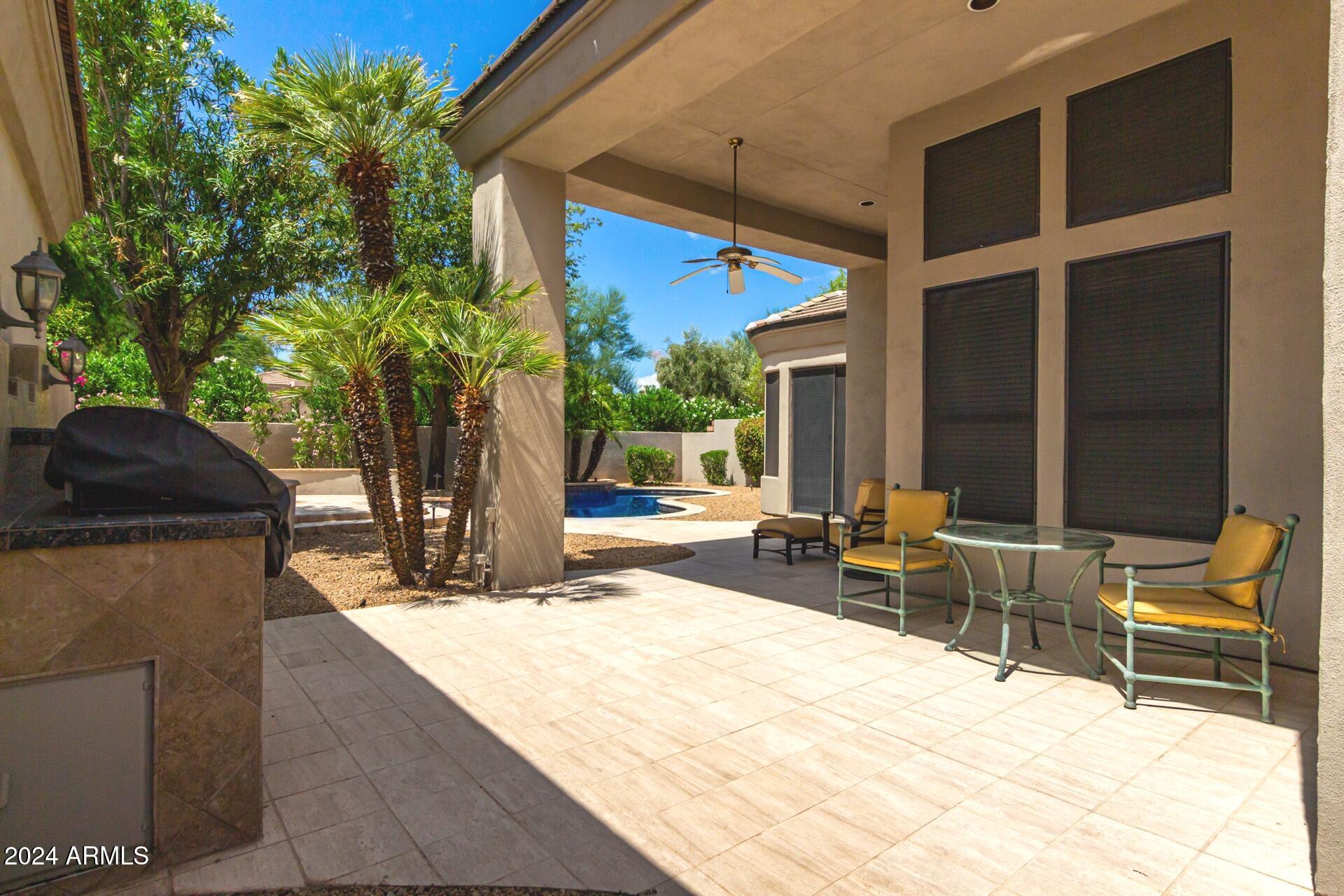 7705 East Doubletree Ranch Road, Unit 28 Scottsdale, AZ 85258 - Photo 32 of 49 Private backyard with covered patio