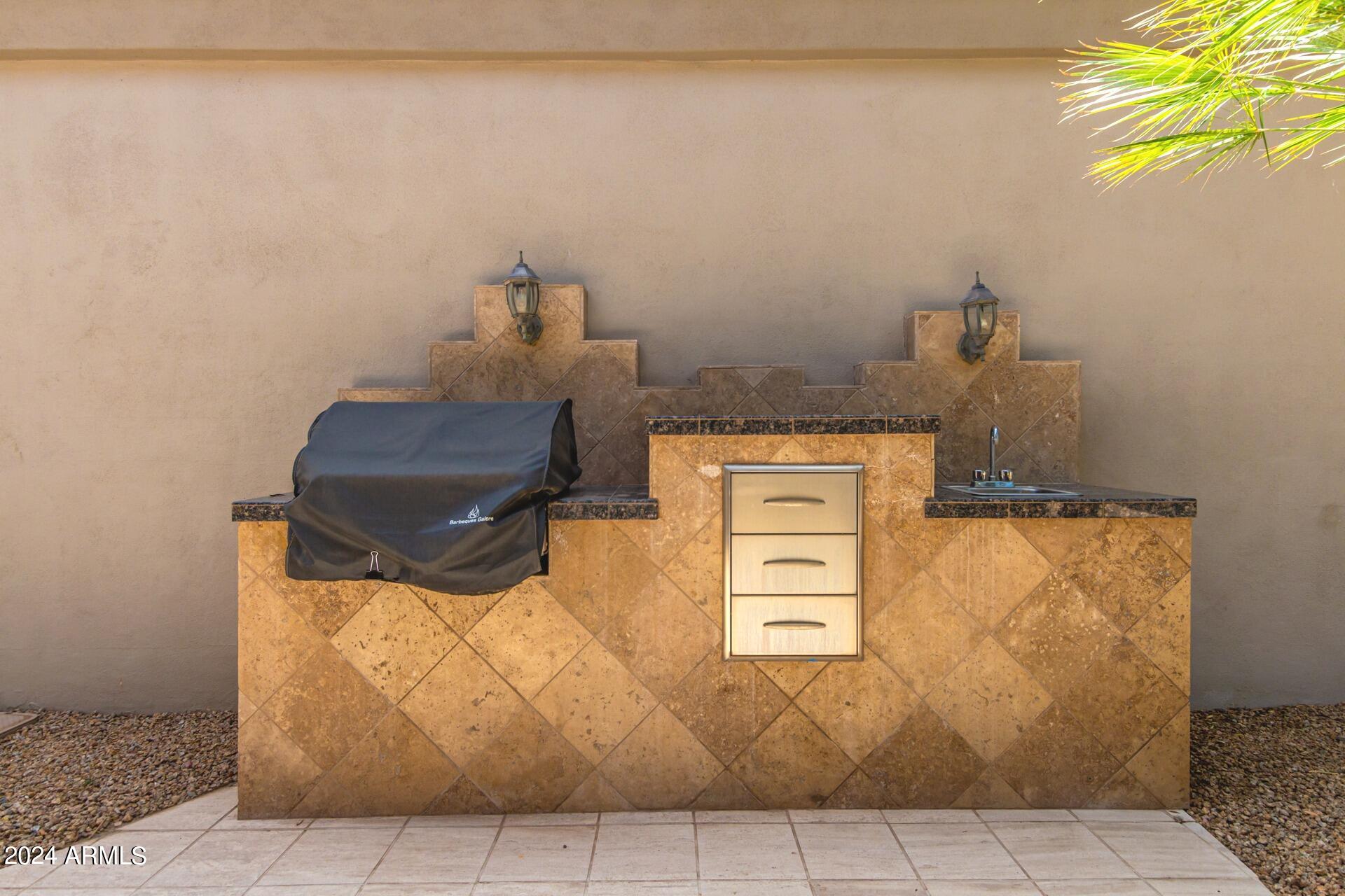 7705 East Doubletree Ranch Road, Unit 28 Scottsdale, AZ 85258 - Photo 34 of 49 Built in BBQ