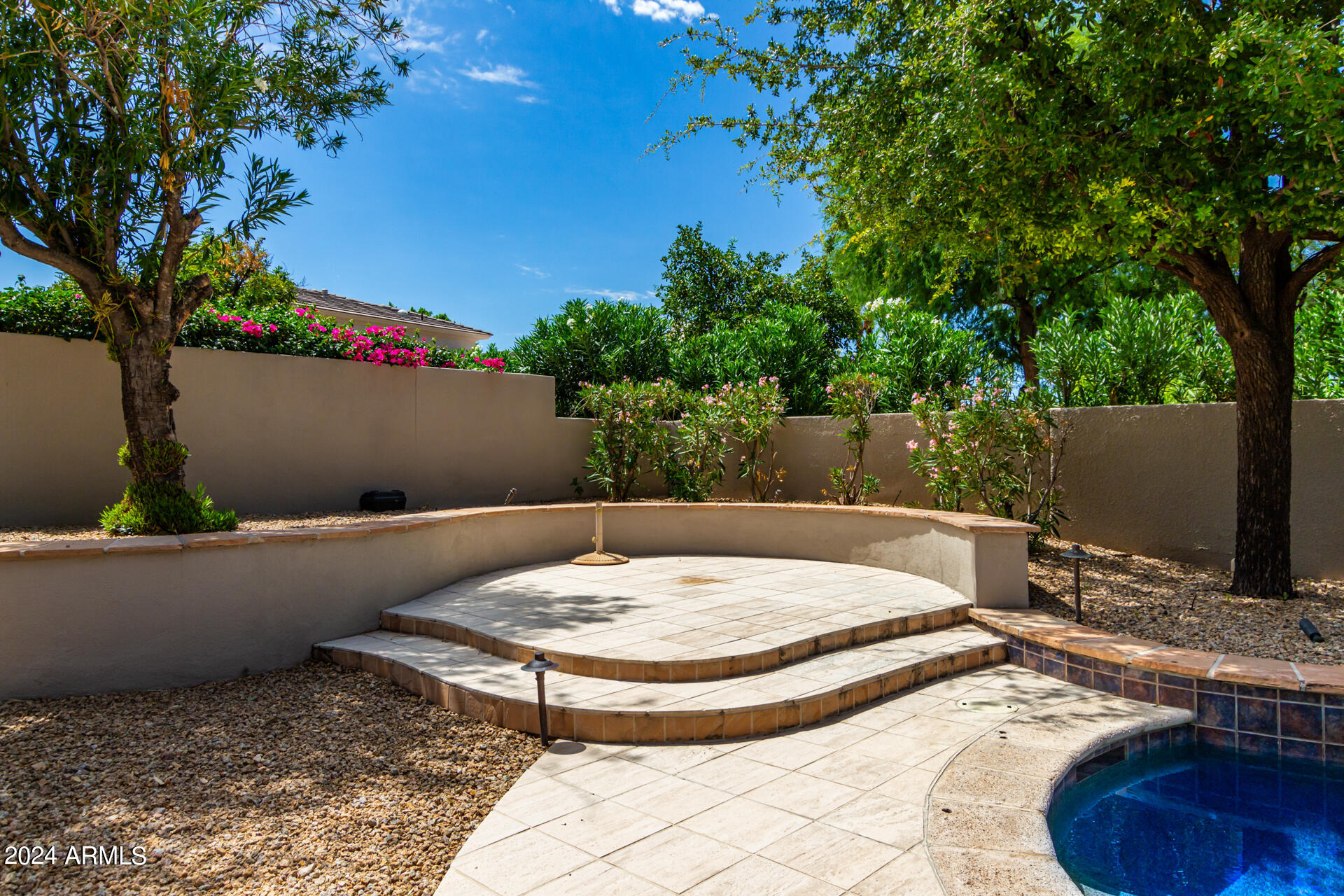 7705 East Doubletree Ranch Road, Unit 28 Scottsdale, AZ 85258 - Photo 37 of 49 Raised area for al-fresco dining