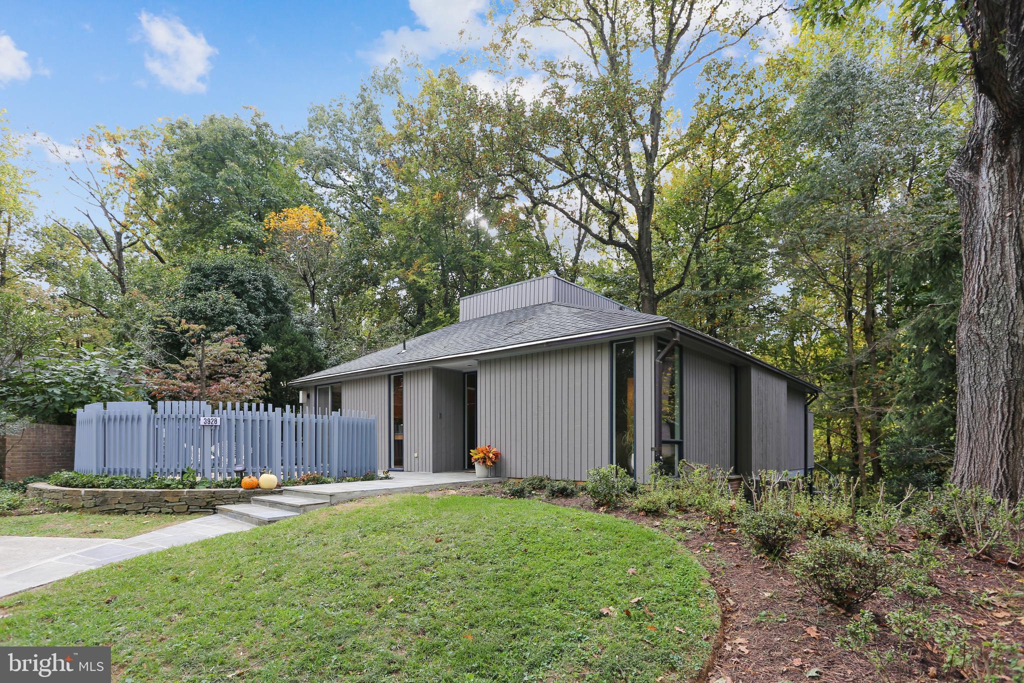 3928 Rickover Road Silver Spring, MD 20902 - Photo 1 of 62 a view of a house with backyard and wooden fence