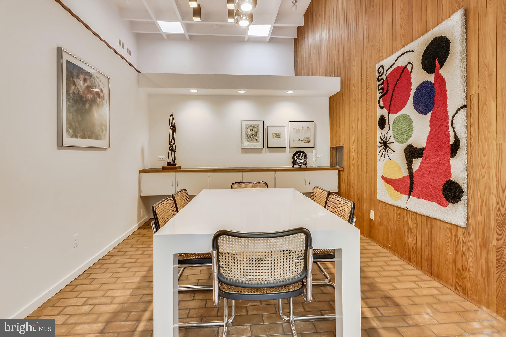 3928 Rickover Road Silver Spring, MD 20902 - Photo 16 of 62 a bedroom with a bed and a painting on the wall