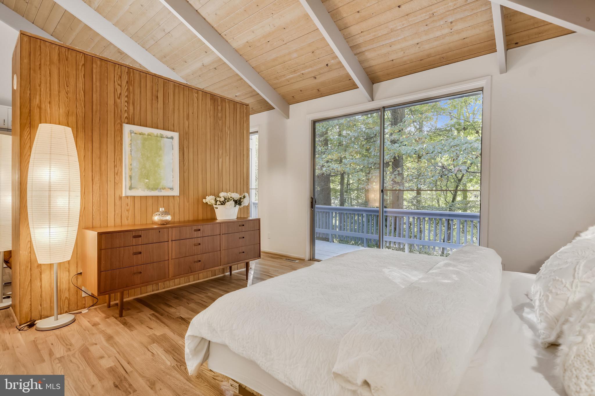 3928 Rickover Road Silver Spring, MD 20902 - Photo 22 of 62 a bed room with a bed and a dresser