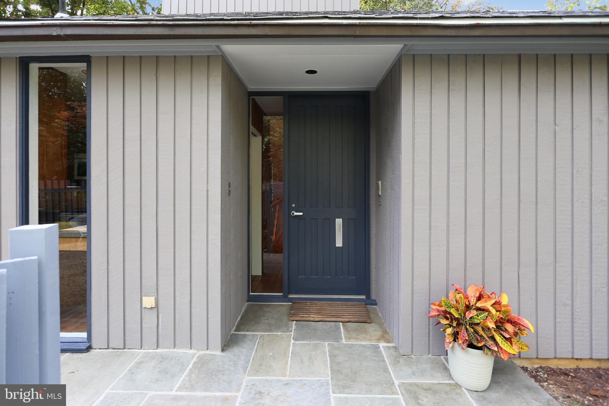 3928 Rickover Road Silver Spring, MD 20902 - Photo 4 of 62 A flagstone walkway leads to covered entrance.