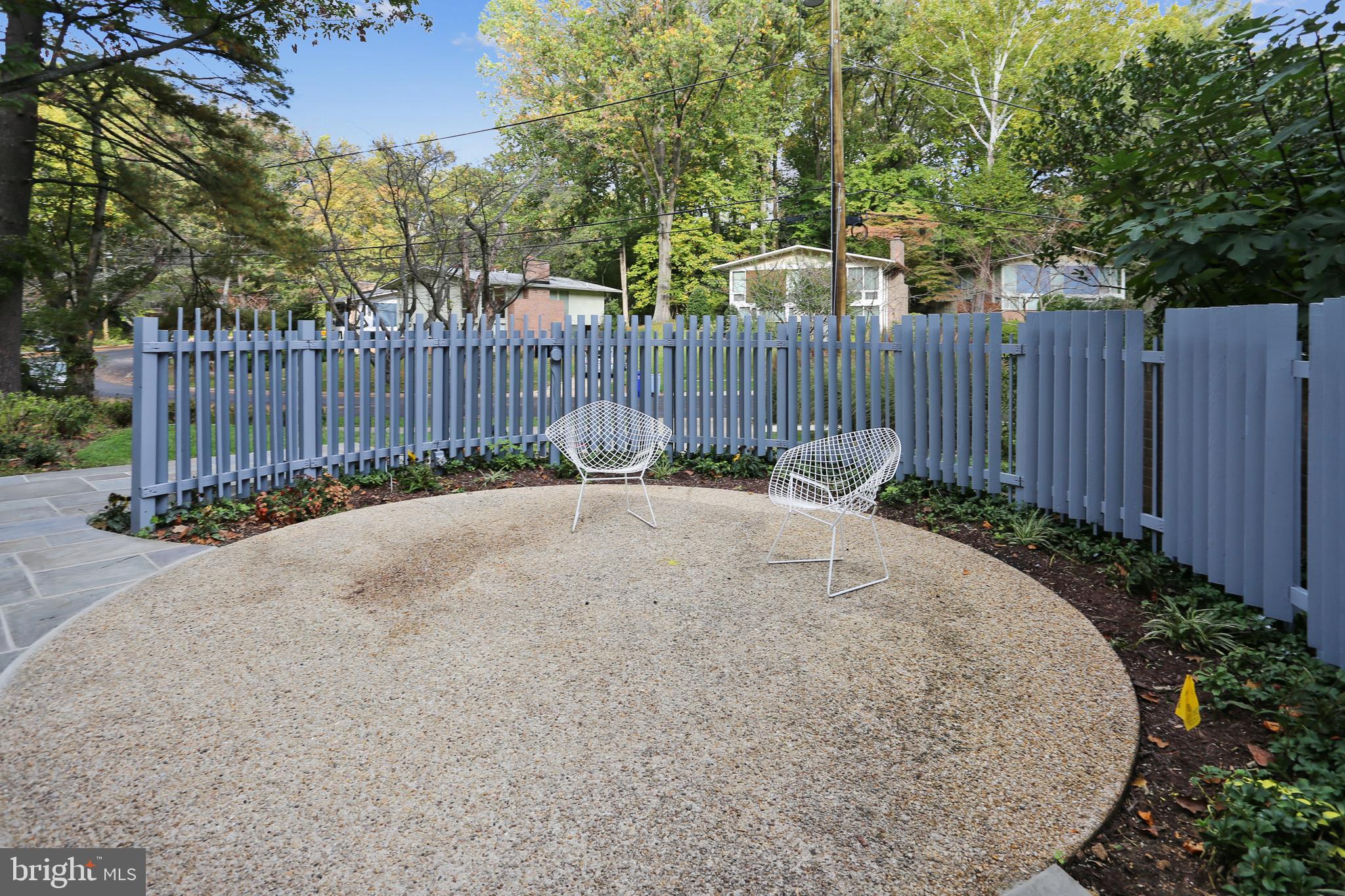 3928 Rickover Road Silver Spring, MD 20902 - Photo 5 of 62 a view of a backyard with wooden fence