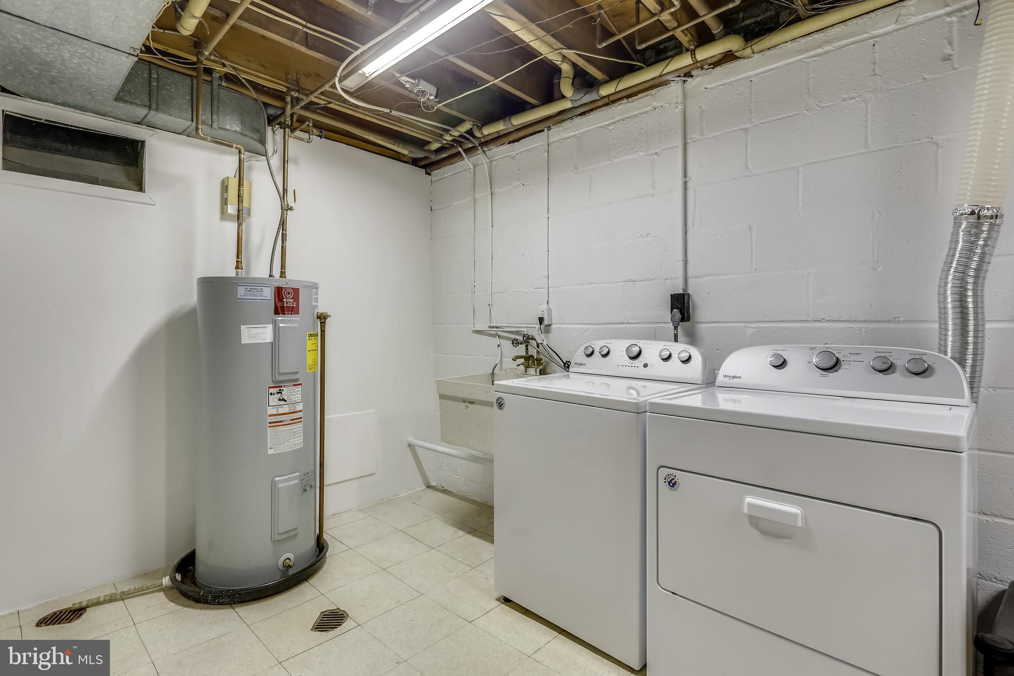 3928 Rickover Road Silver Spring, MD 20902 - Photo 49 of 62 a utility room with cabinets