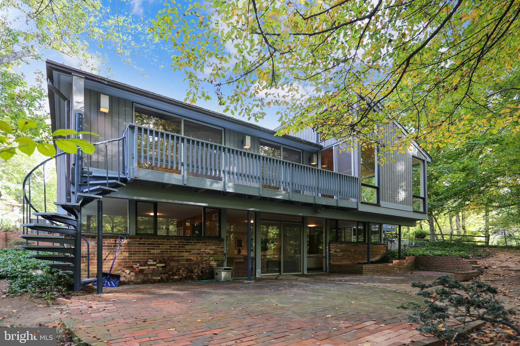 3928 Rickover Road Silver Spring, MD 20902 - Photo 6 of 62 a front view of a building with garden