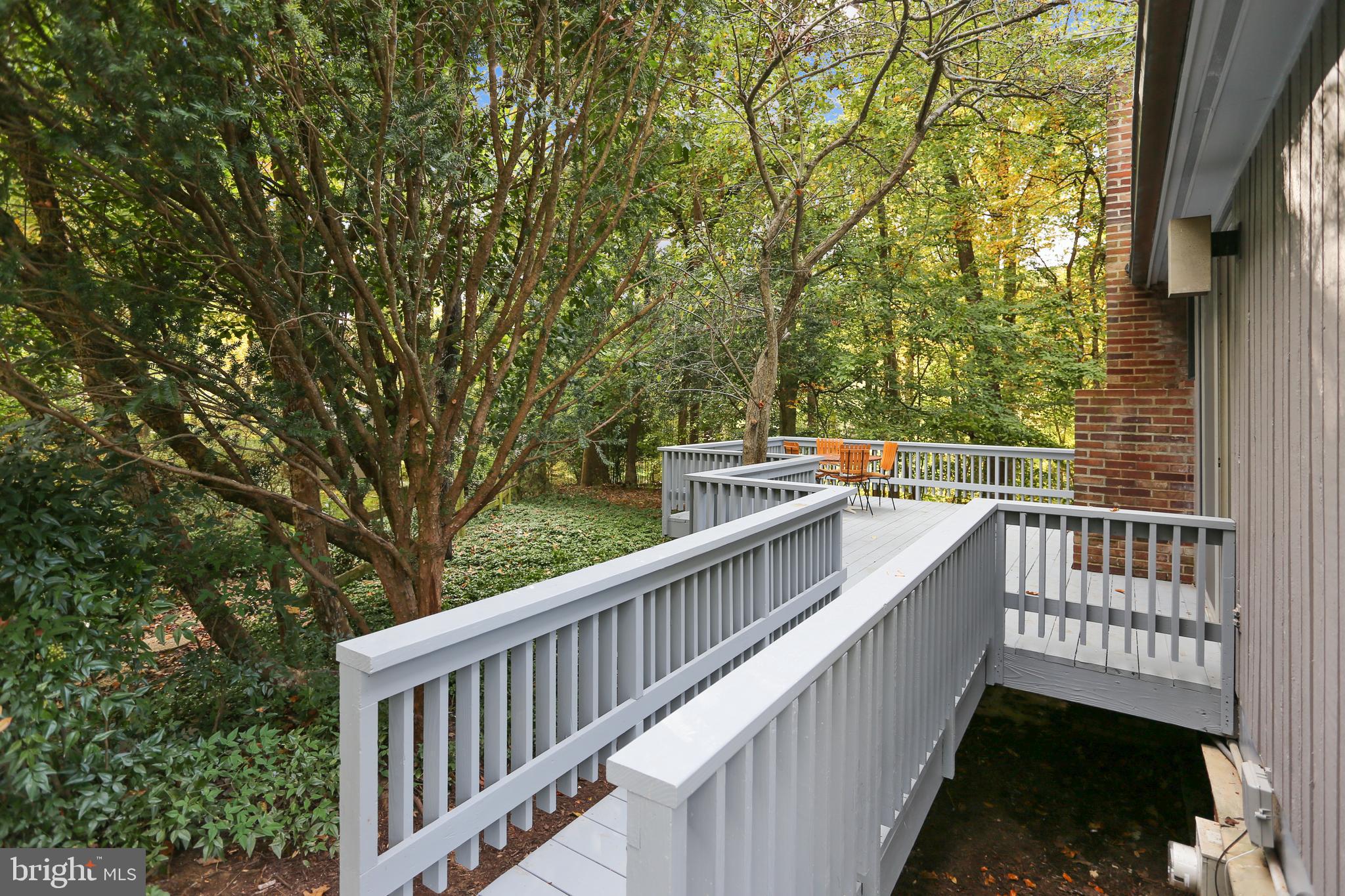 3928 Rickover Road Silver Spring, MD 20902 - Photo 51 of 62 a view of balcony with wooden floor and fence