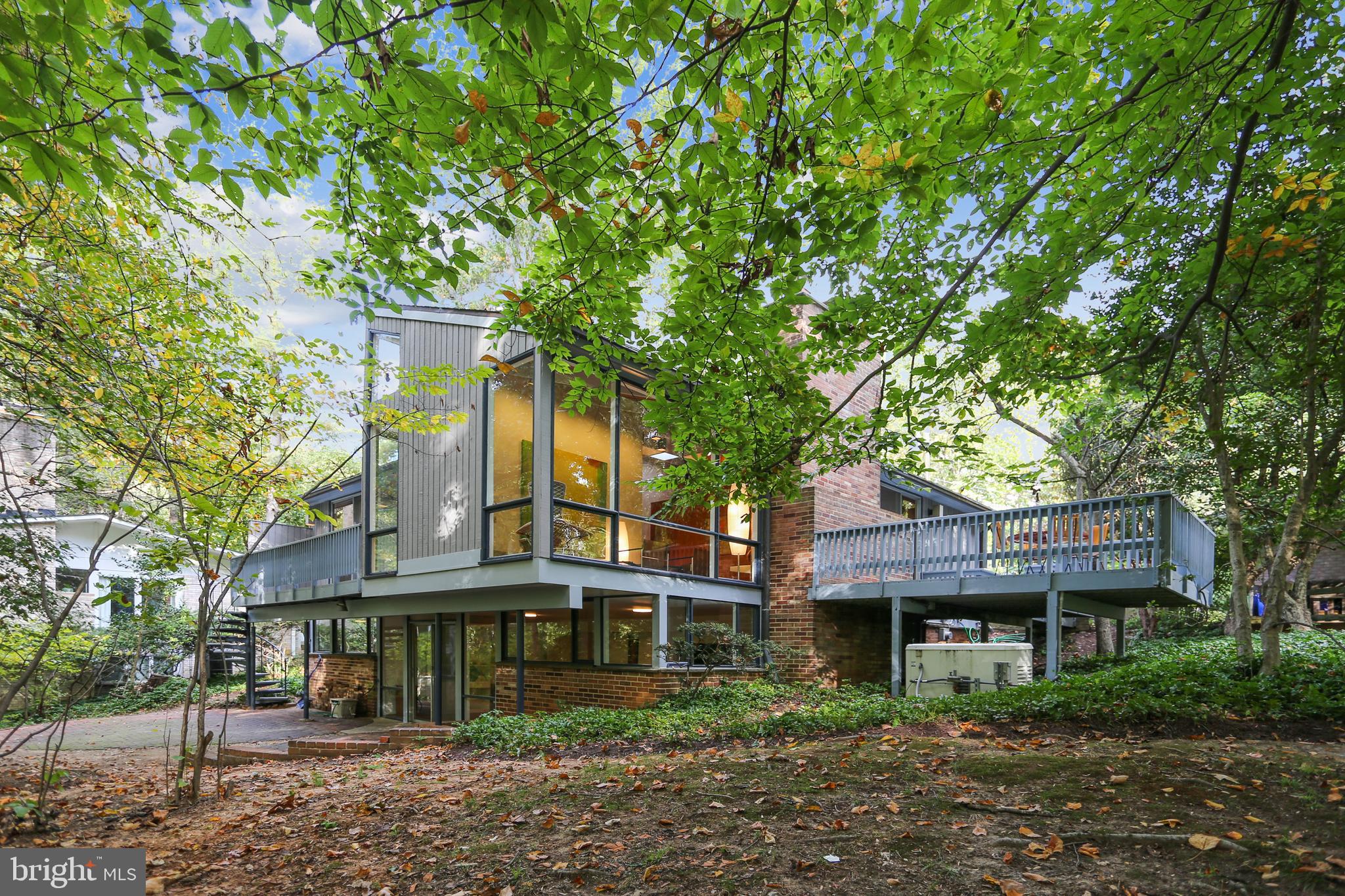 3928 Rickover Road Silver Spring, MD 20902 - Photo 7 of 62 a front view of a house with a garden