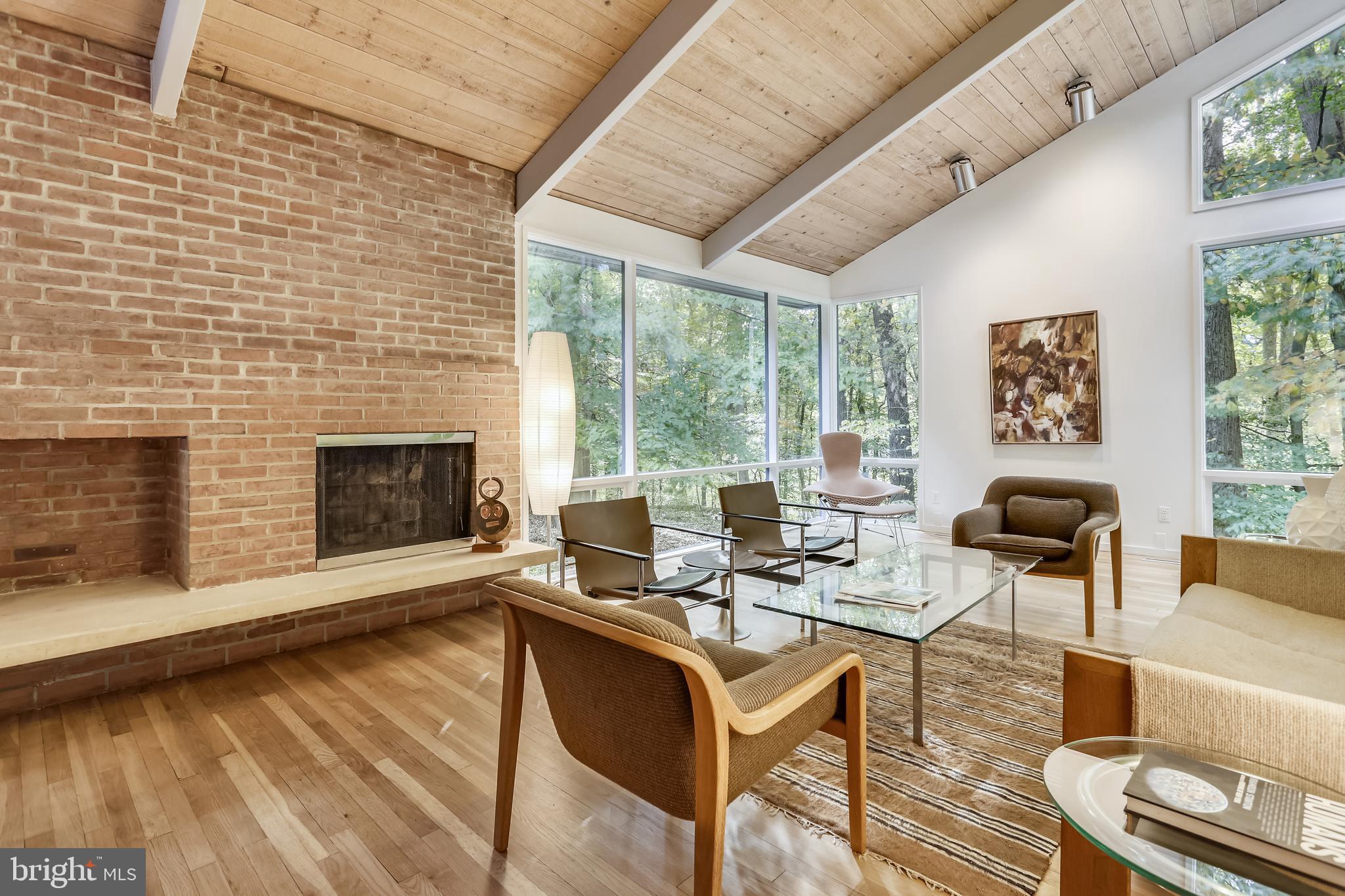 3928 Rickover Road Silver Spring, MD 20902 - Photo 10 of 62 a work room with furniture and a fireplace