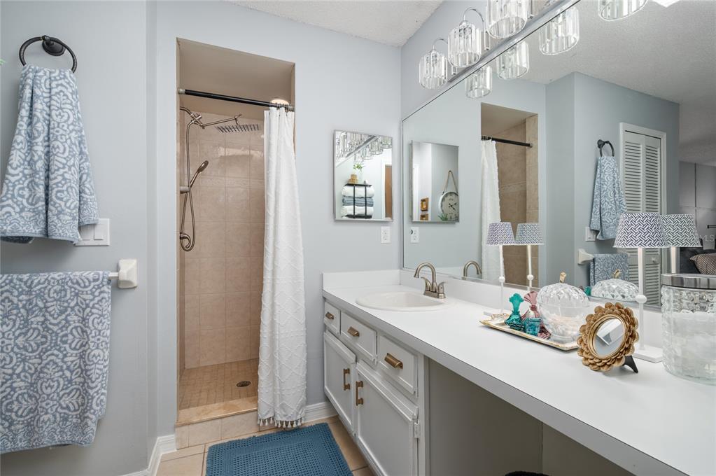 22 Rosedown Boulevard DeBary, FL 32713 - Photo 20 of 31 a bathroom with a sink double vanity and a mirror