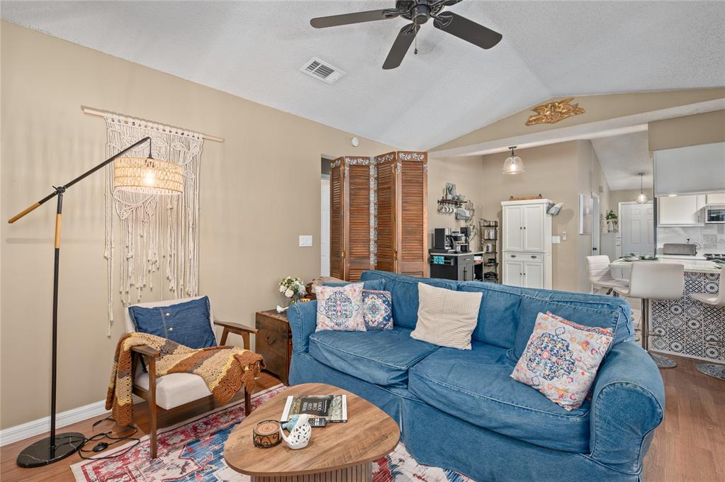 22 Rosedown Boulevard DeBary, FL 32713 - Photo 23 of 31 a living room with furniture and a large window