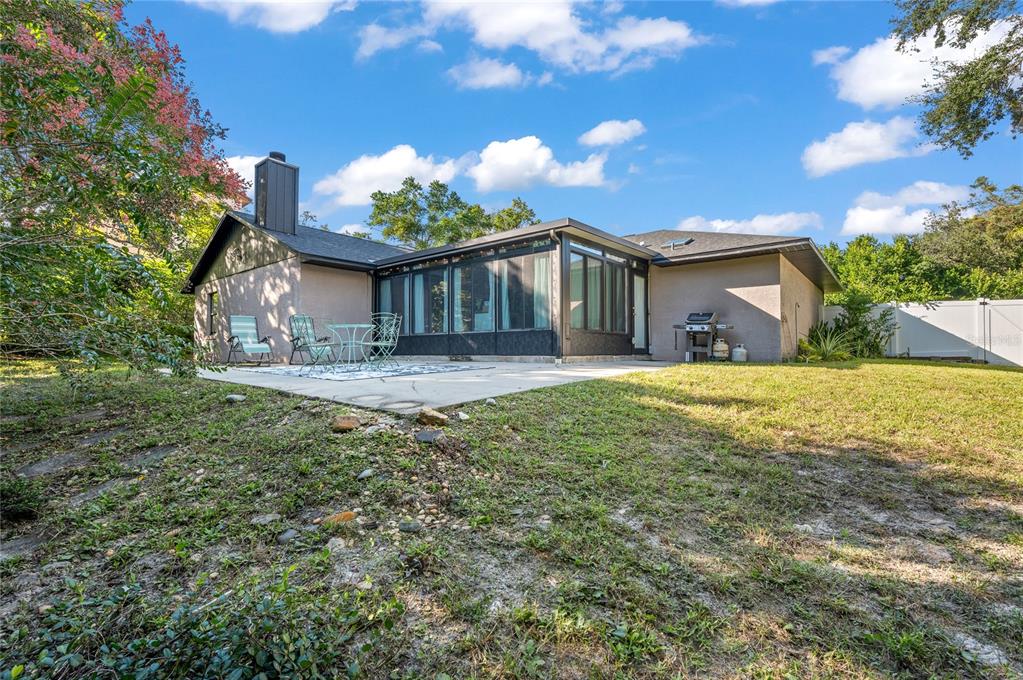 22 Rosedown Boulevard DeBary, FL 32713 - Photo 26 of 31 a view of a house with a yard