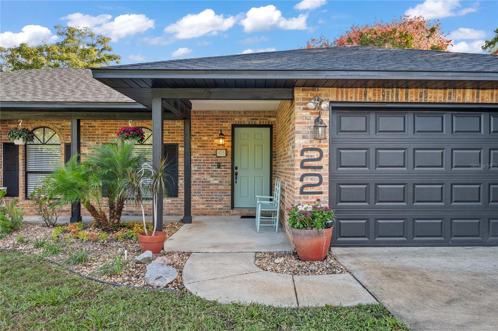 22 Rosedown Boulevard DeBary, FL 32713 - Photo 3 of 31 a view of a house with potted plants