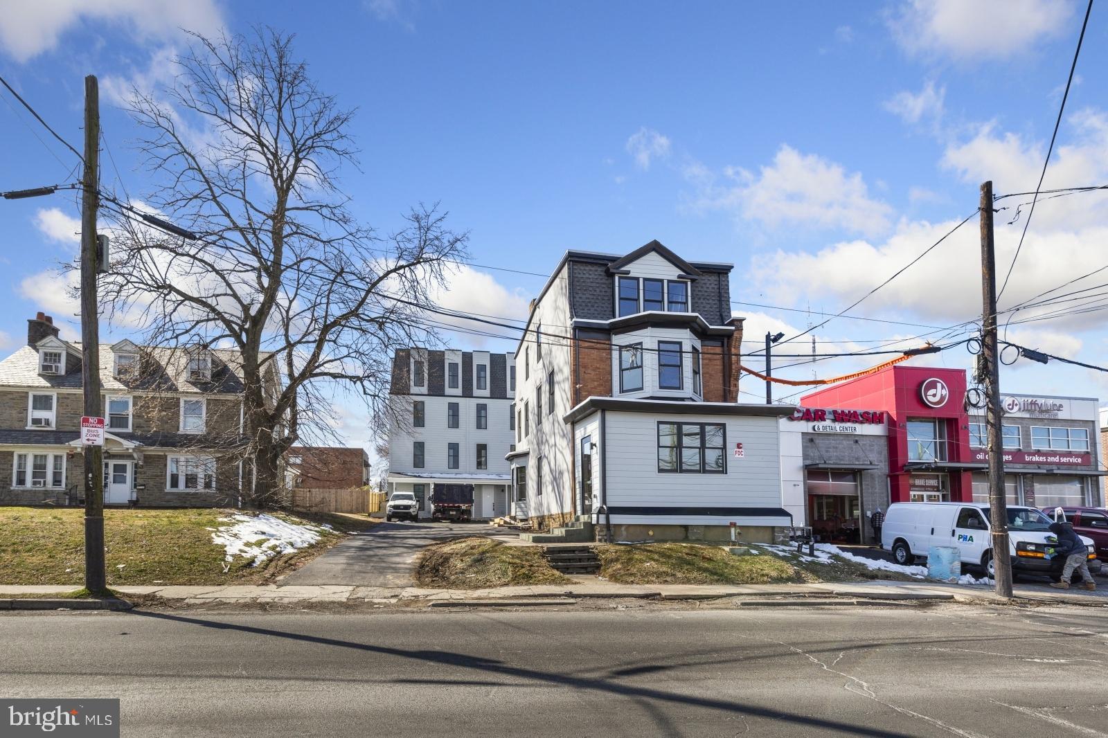 6712 Ridge Avenue, Unit 302 Philadelphia, PA 19128 - Photo 21 of 22 a front view of a building with street
